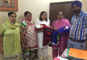 Family visiting the Sofat IVF care team